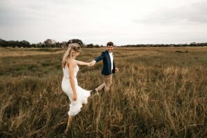 couple walking on grass