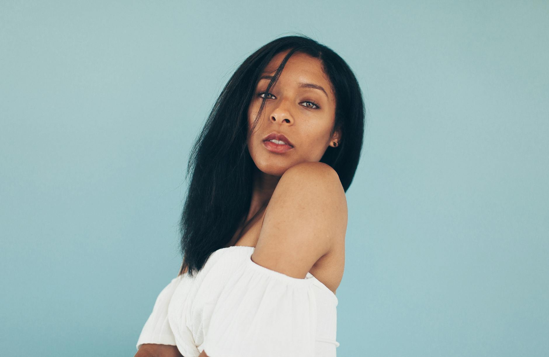 woman in white off shoulder shirt