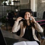 photo of a woman talking on the phone while smiling