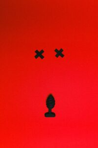 sex toy on a red background
