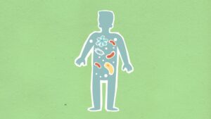 paper applique of human figure with bacteria
