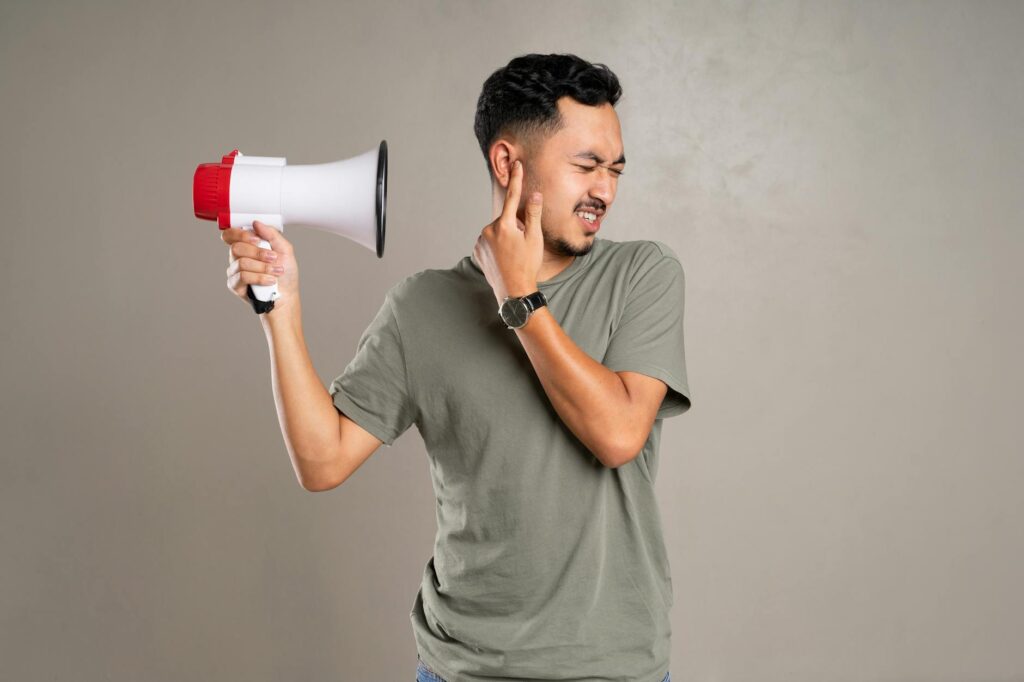 a man holding a megaphone